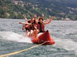 Galerie: Bananaboat fahren am Millstaetter See beim Sporthotel ROYAL X – Urlaub in Kärnten am See – Seevilla Leitner – Ferienhaus am Millstätter See