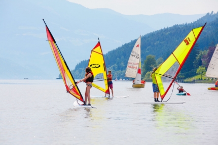 Windsurfen am Millstätter See beim Sporthotel ROYAL X – Urlaub im Ferienhaus – Ferienhaus am See – Seevilla Leitner – Urlaub in Kärnten am See